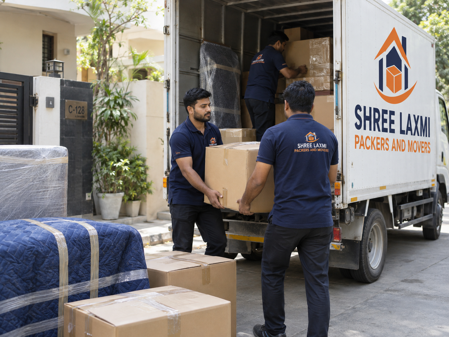 Shree Laxmi Packers & Movers team handling household goods with care
